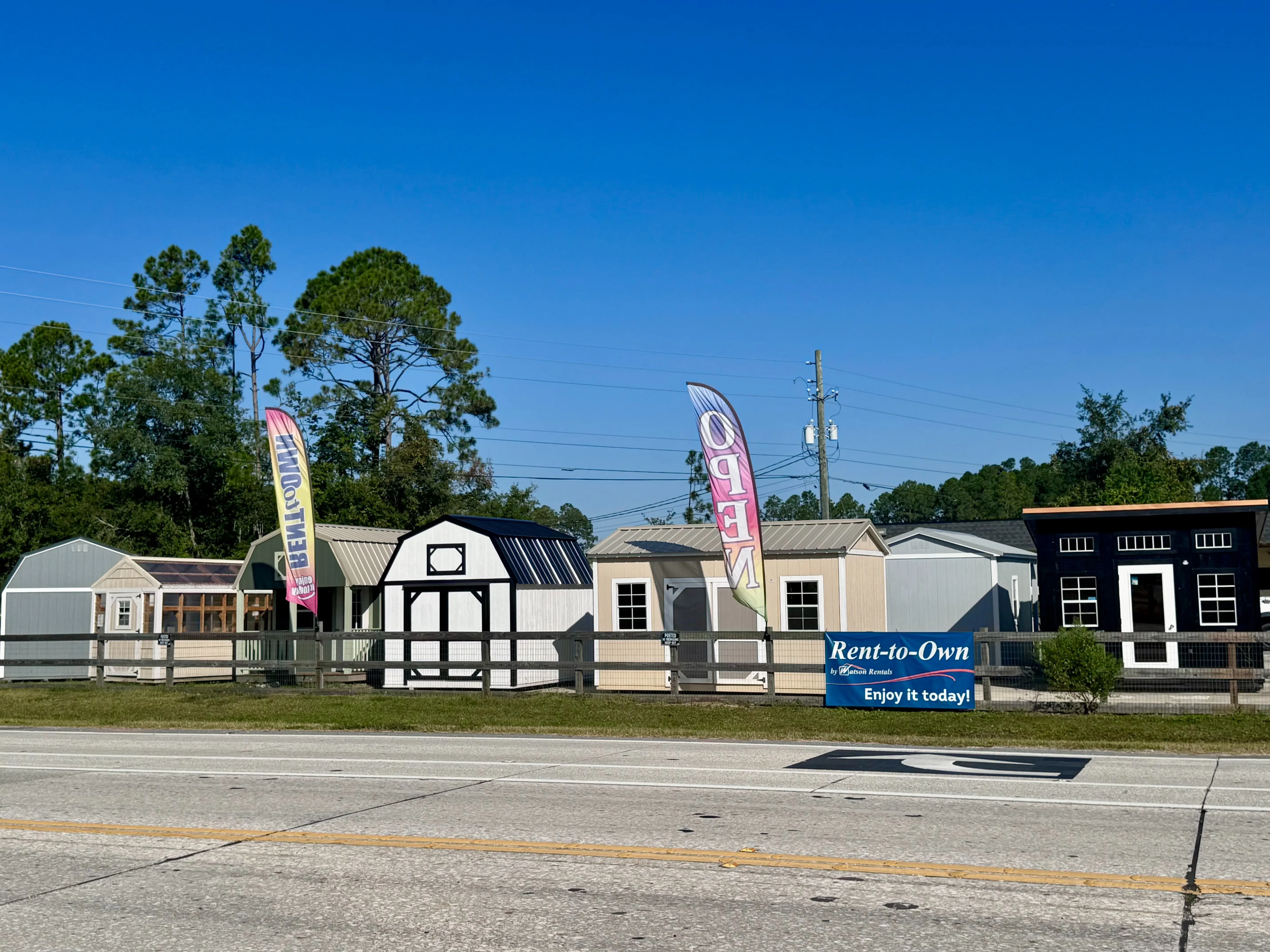 Jacksonville, FL sales lot with sheds on display