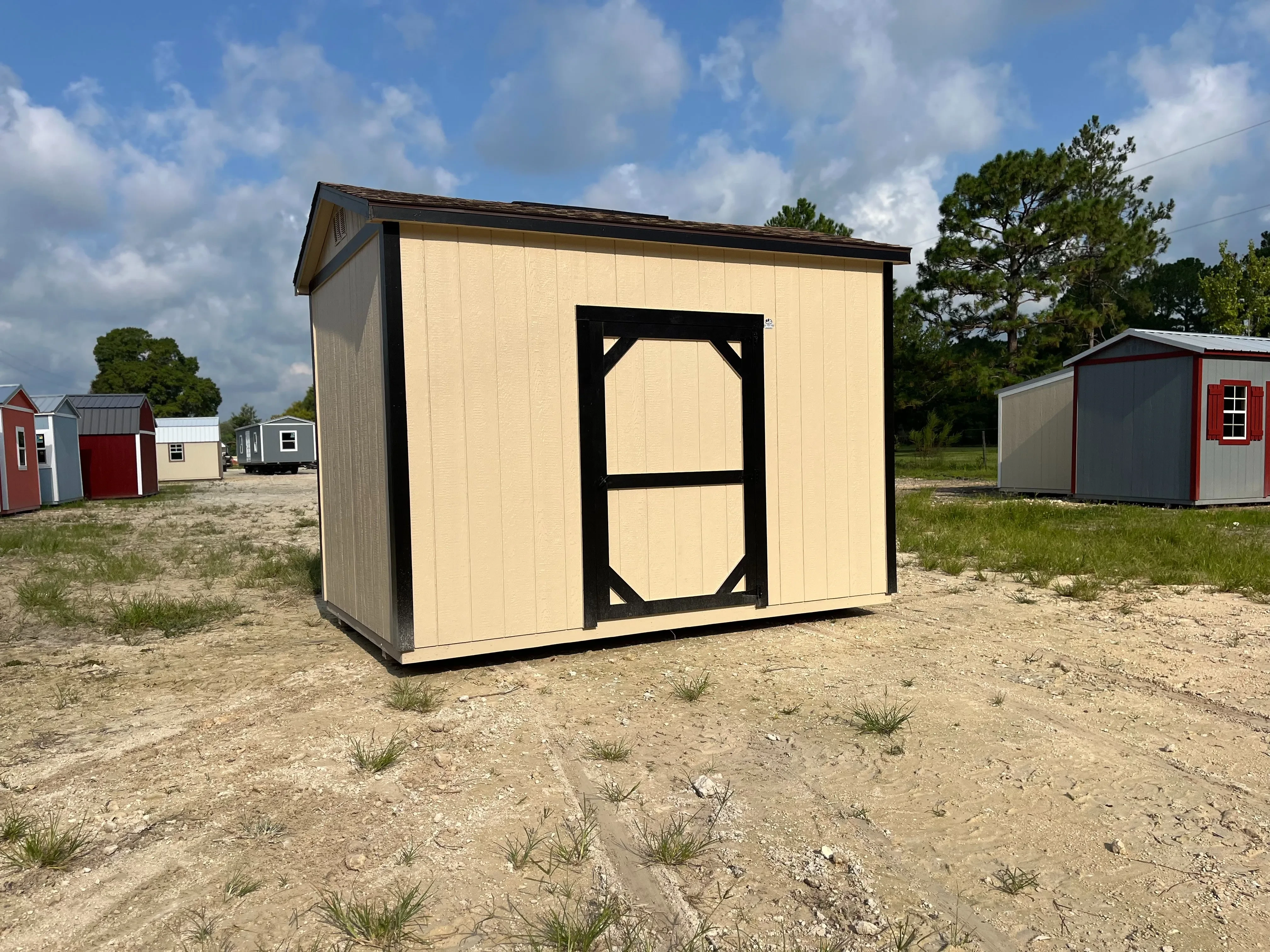 Exterior of an 8x12 side garden shed with a single wood door