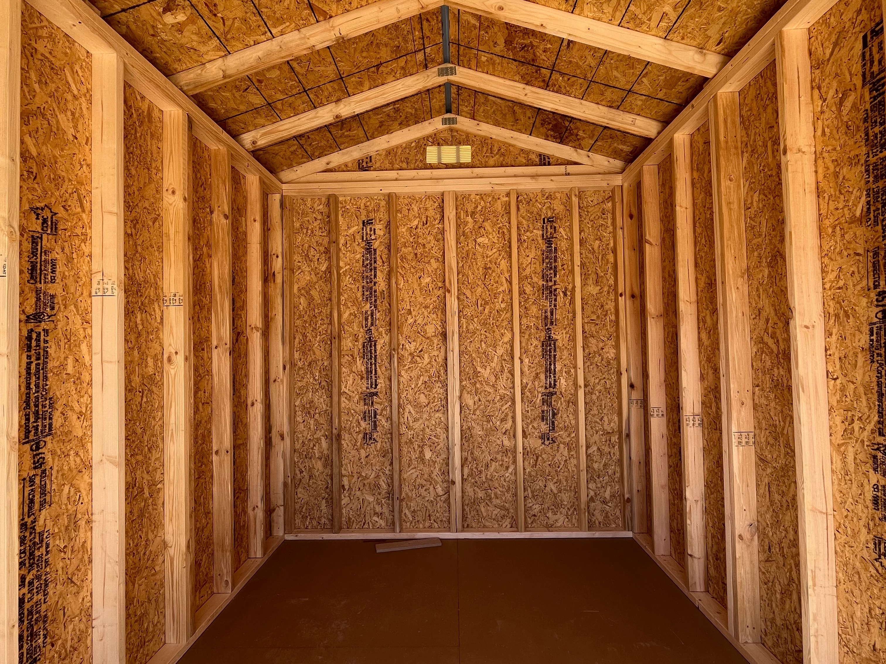 Interior of an 8x12 showing through the wood doors