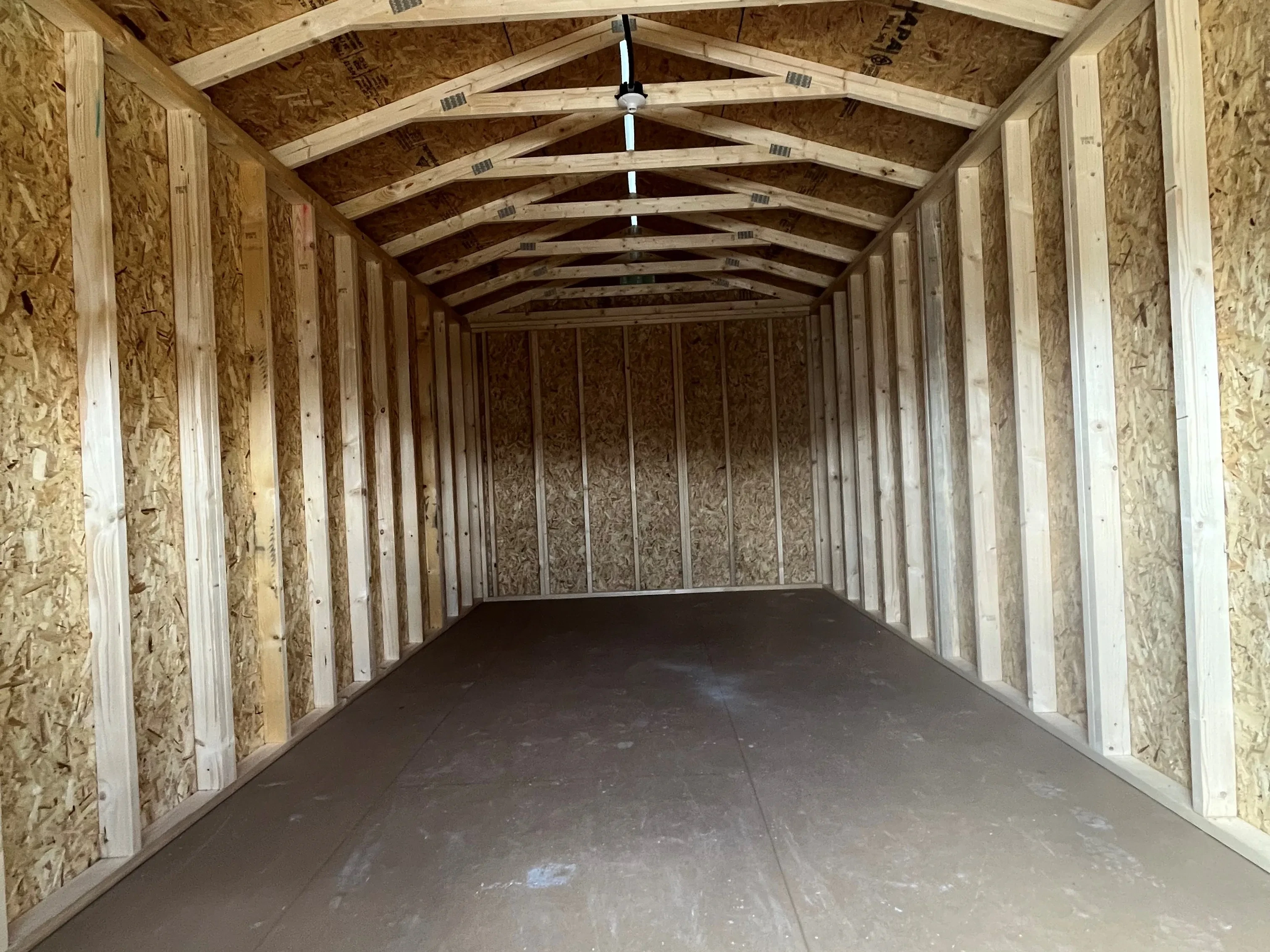 Interior of a 10x20 garden shed showing through the double doors