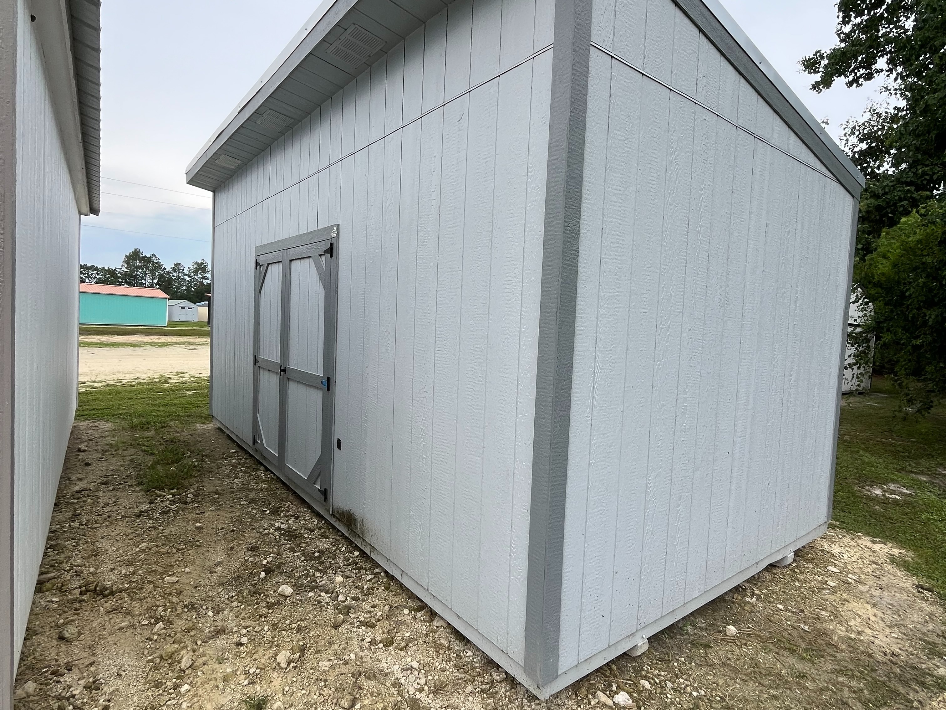 Exterior left corner of the grey 10x20 urban shed