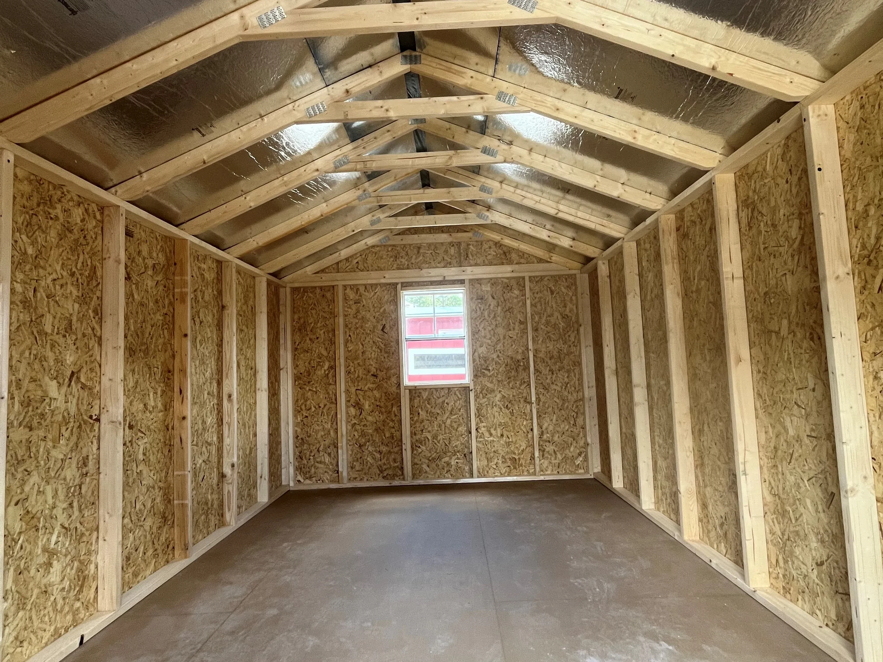 Interior of a 10x16 garden shed economy with radiant barrier and a window