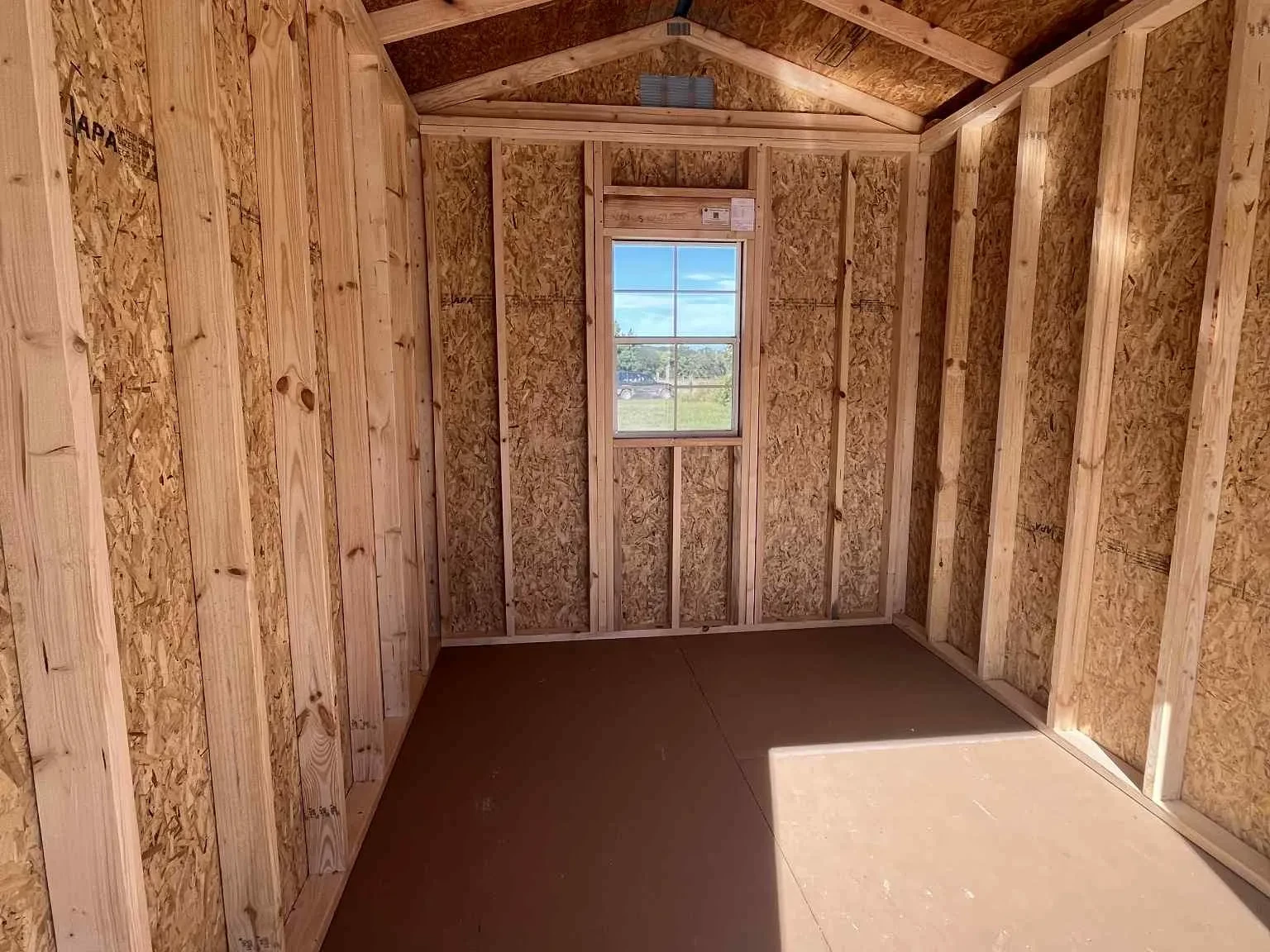 Interior of an 8x12 garden shed with a window