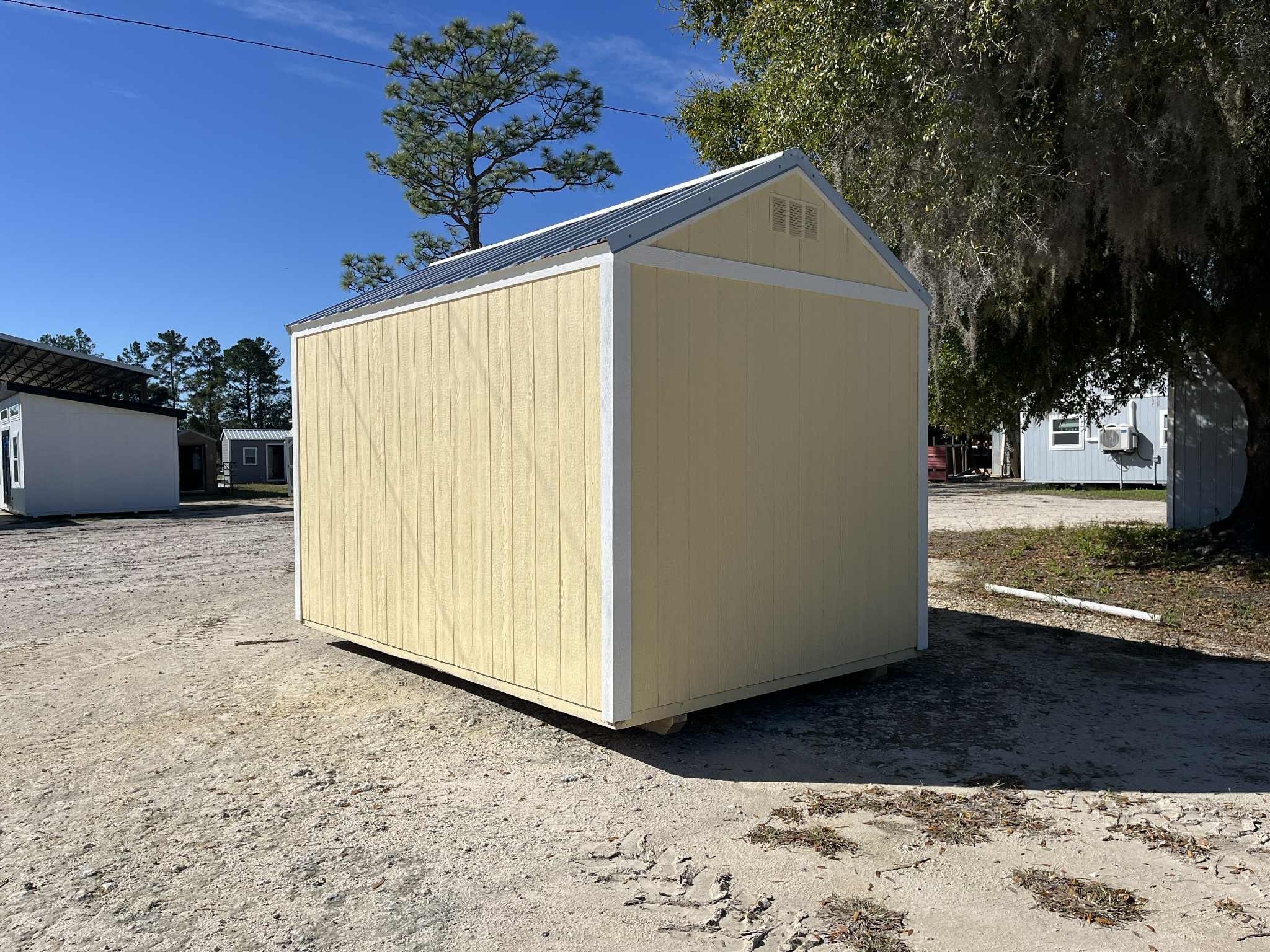 Exterior rear photo of a yellow 8x12 Garden Shed Economy 