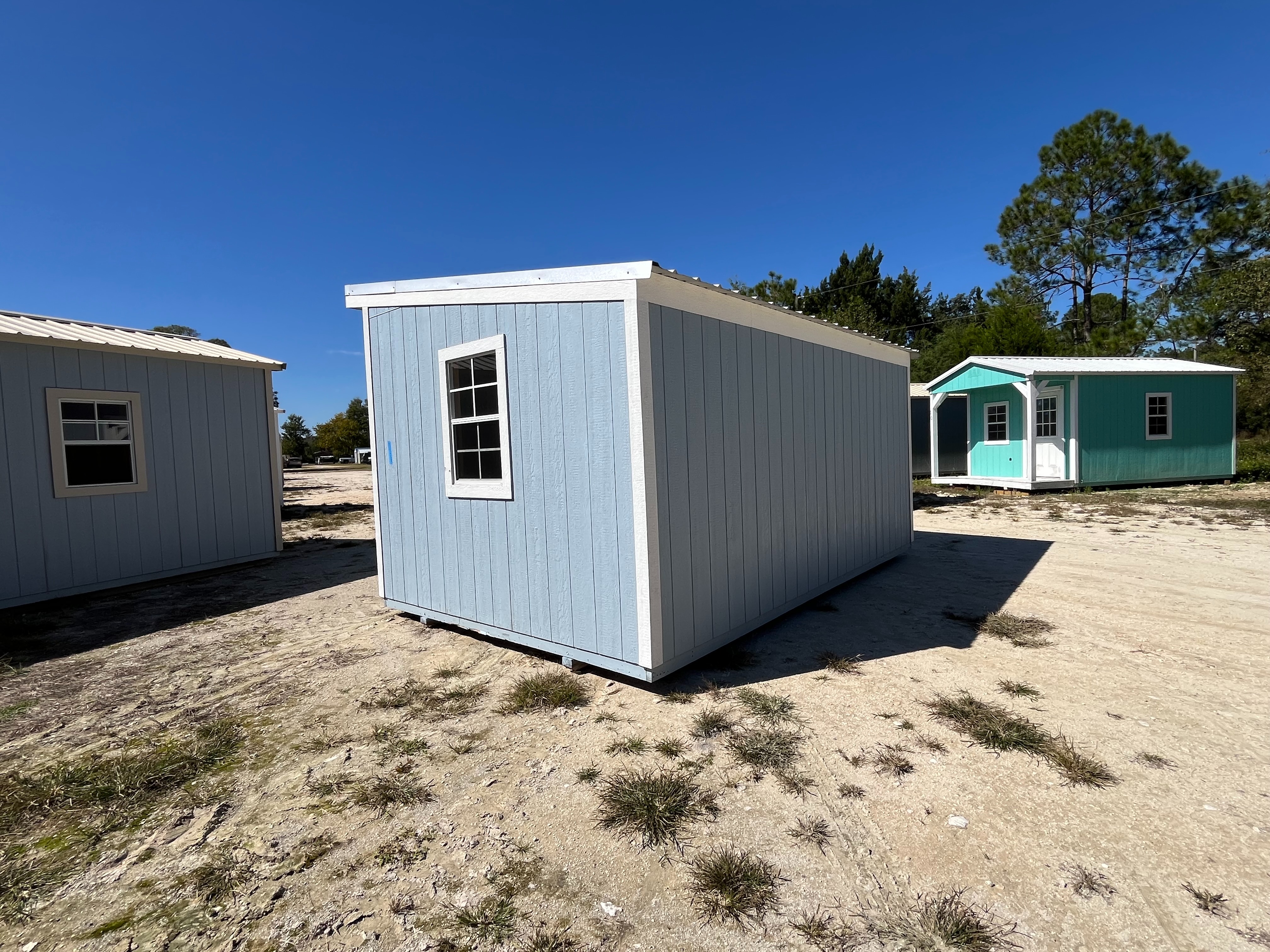 Exterior  rear side of a 10x16 urban shed that has  a window