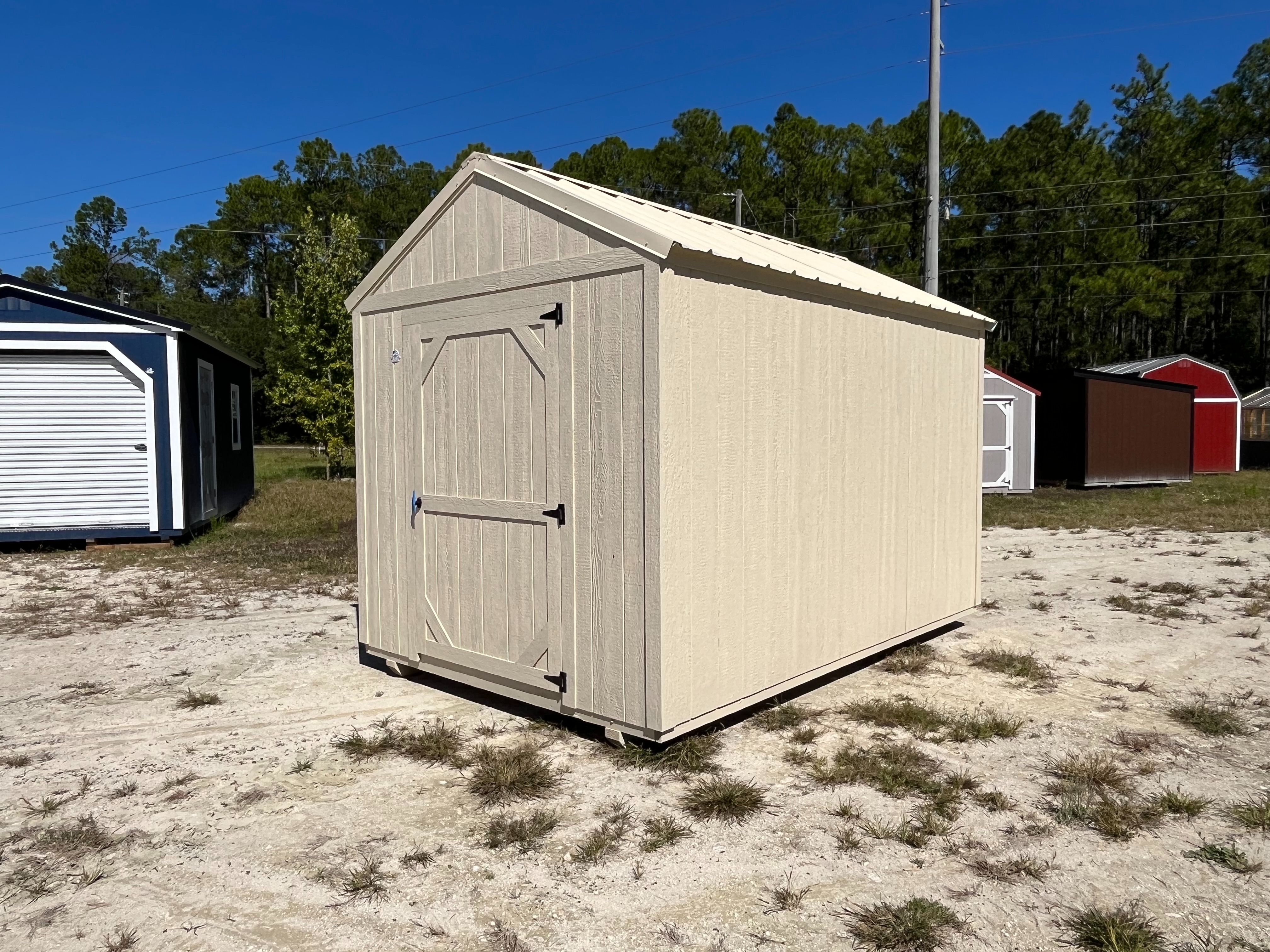 Exterior photo of an almond 8x12 Garden Shed Economy showing right side and front