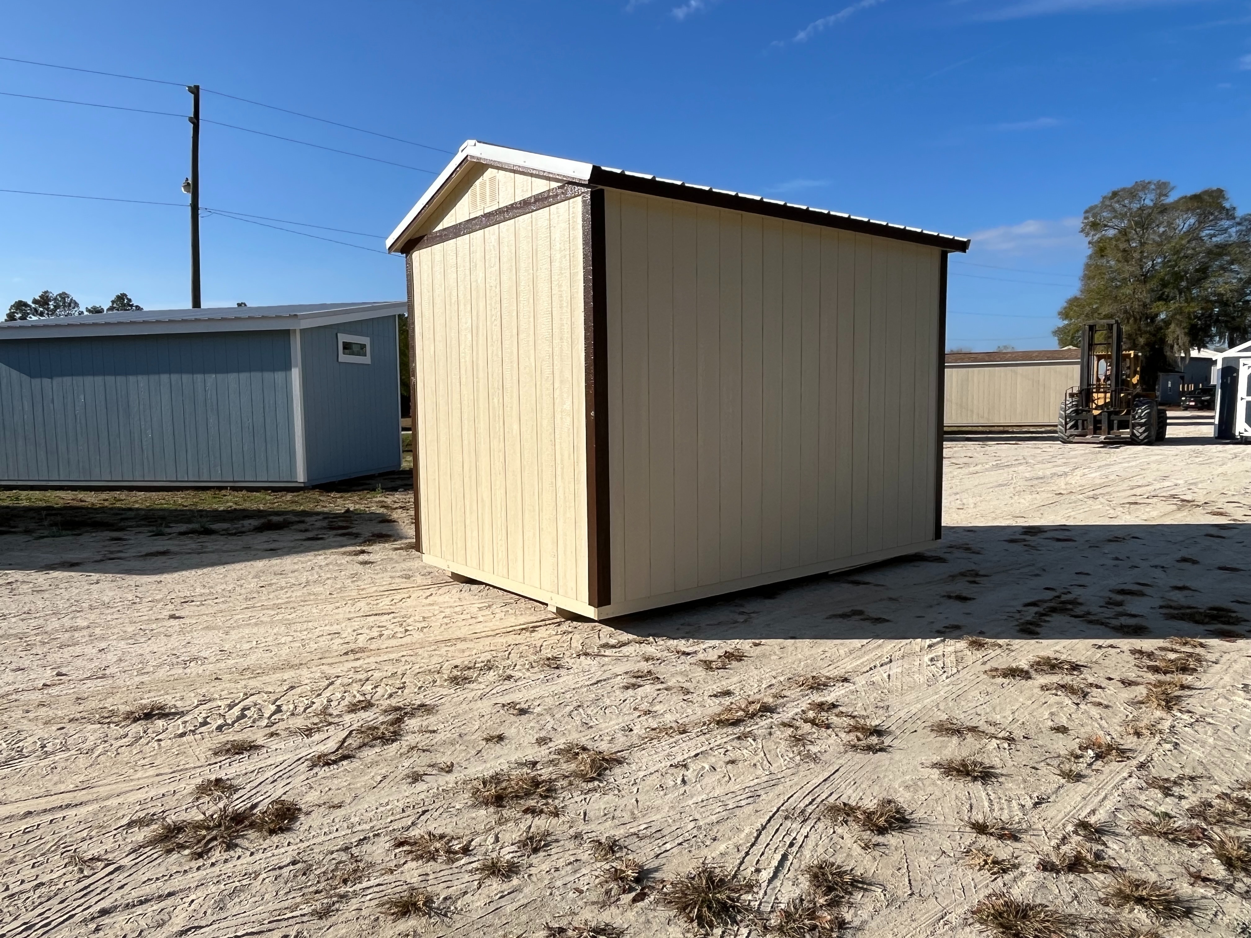 Exterior rear view of almond and brown 8x12 side garden shed