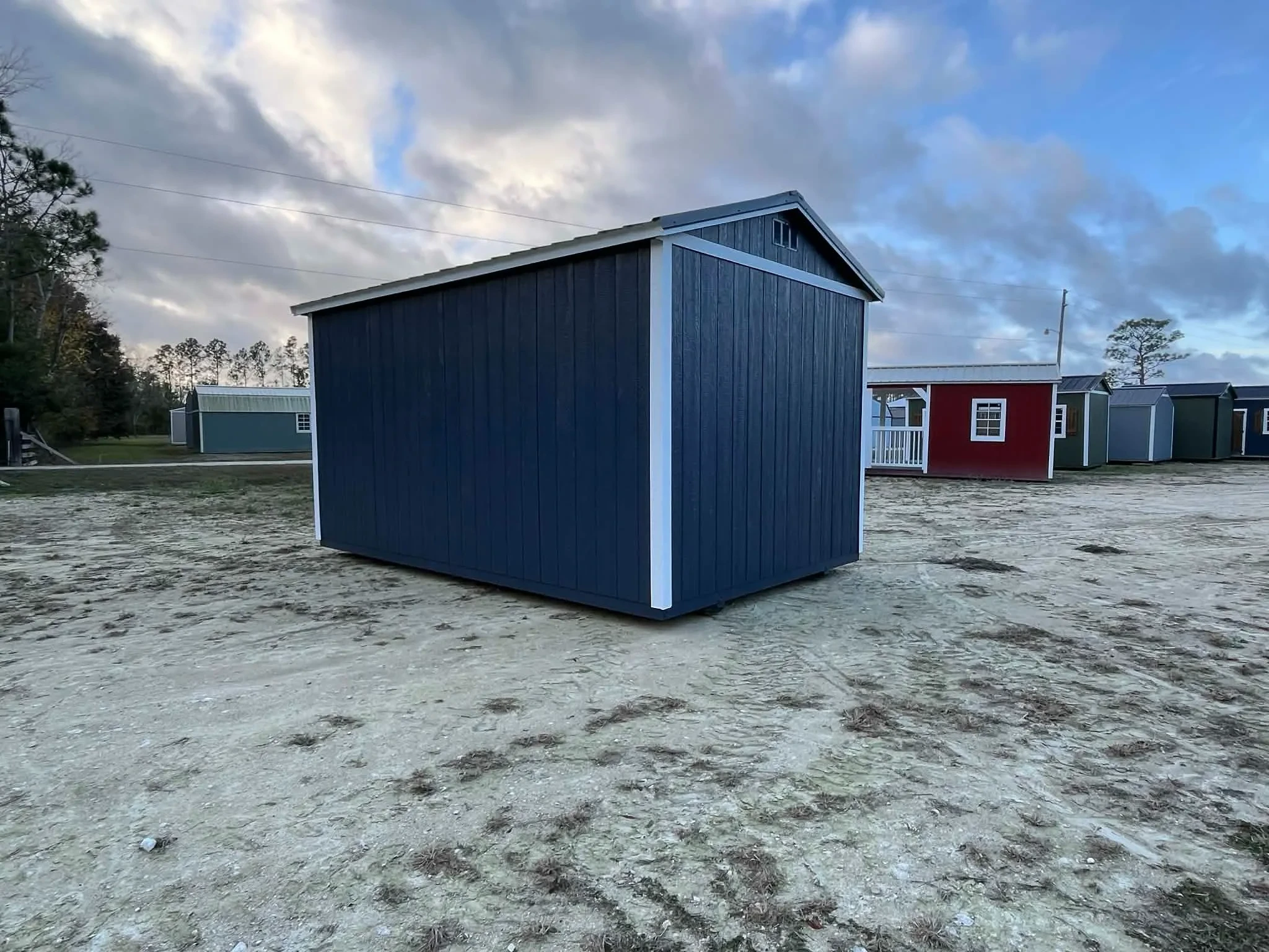 Rear of a dark blue 10x16 side garden shed