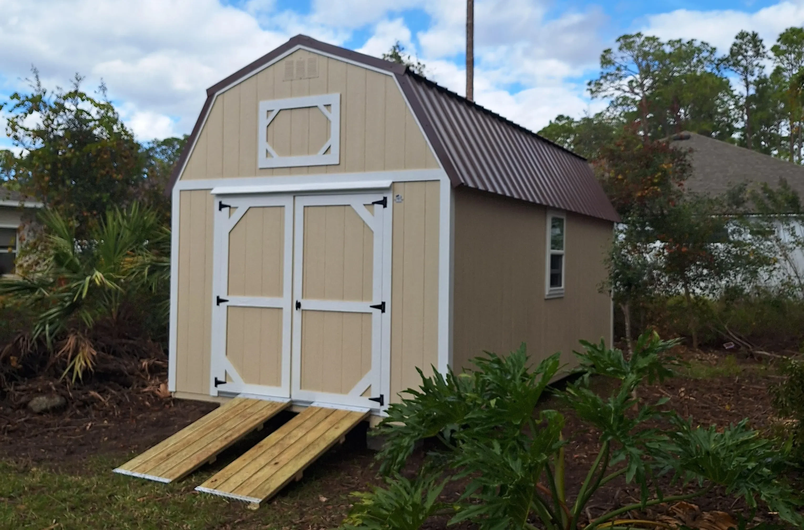 Tan lofted barn set up with ramp