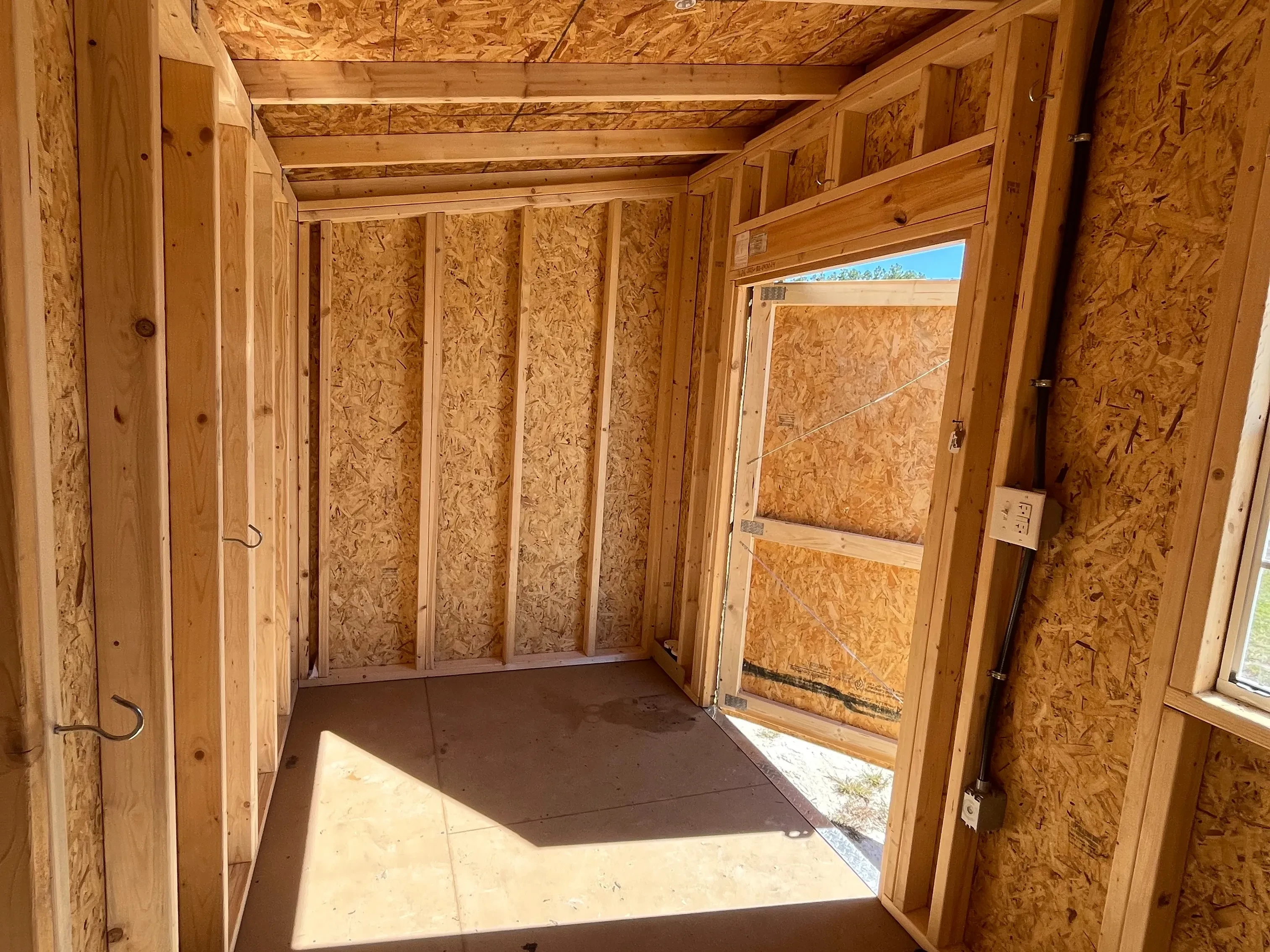 Interior of a 6x12 urban showing the door