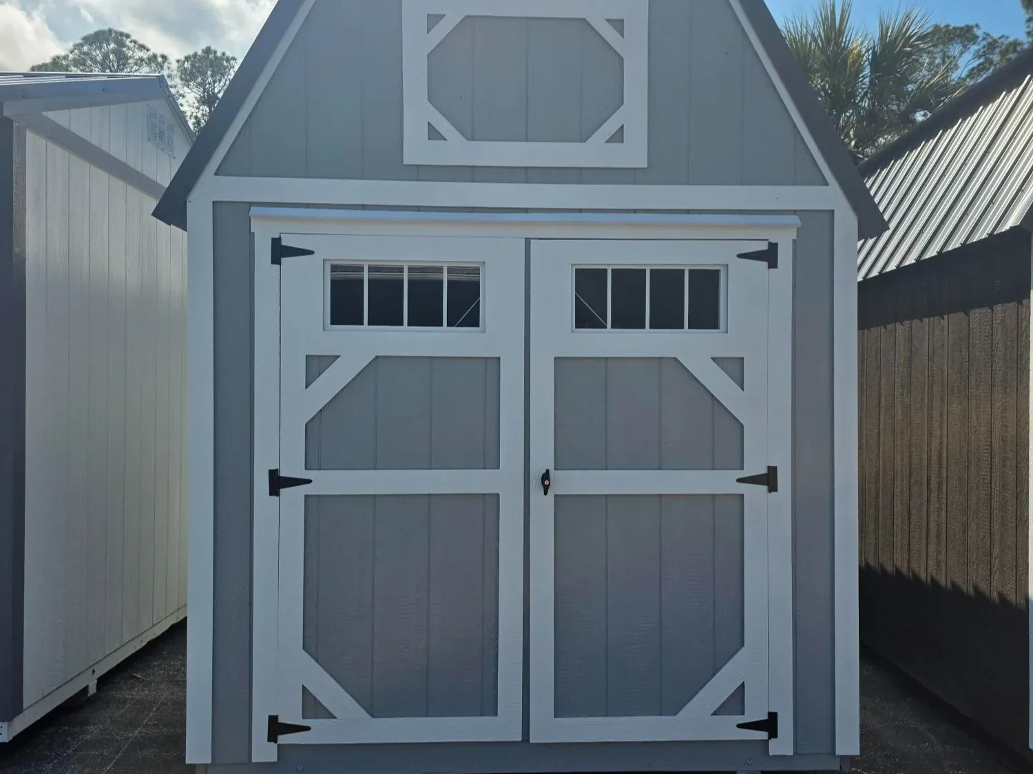 Exterior of 8x12 Lofted barn with 6' Barn doors with transom windows