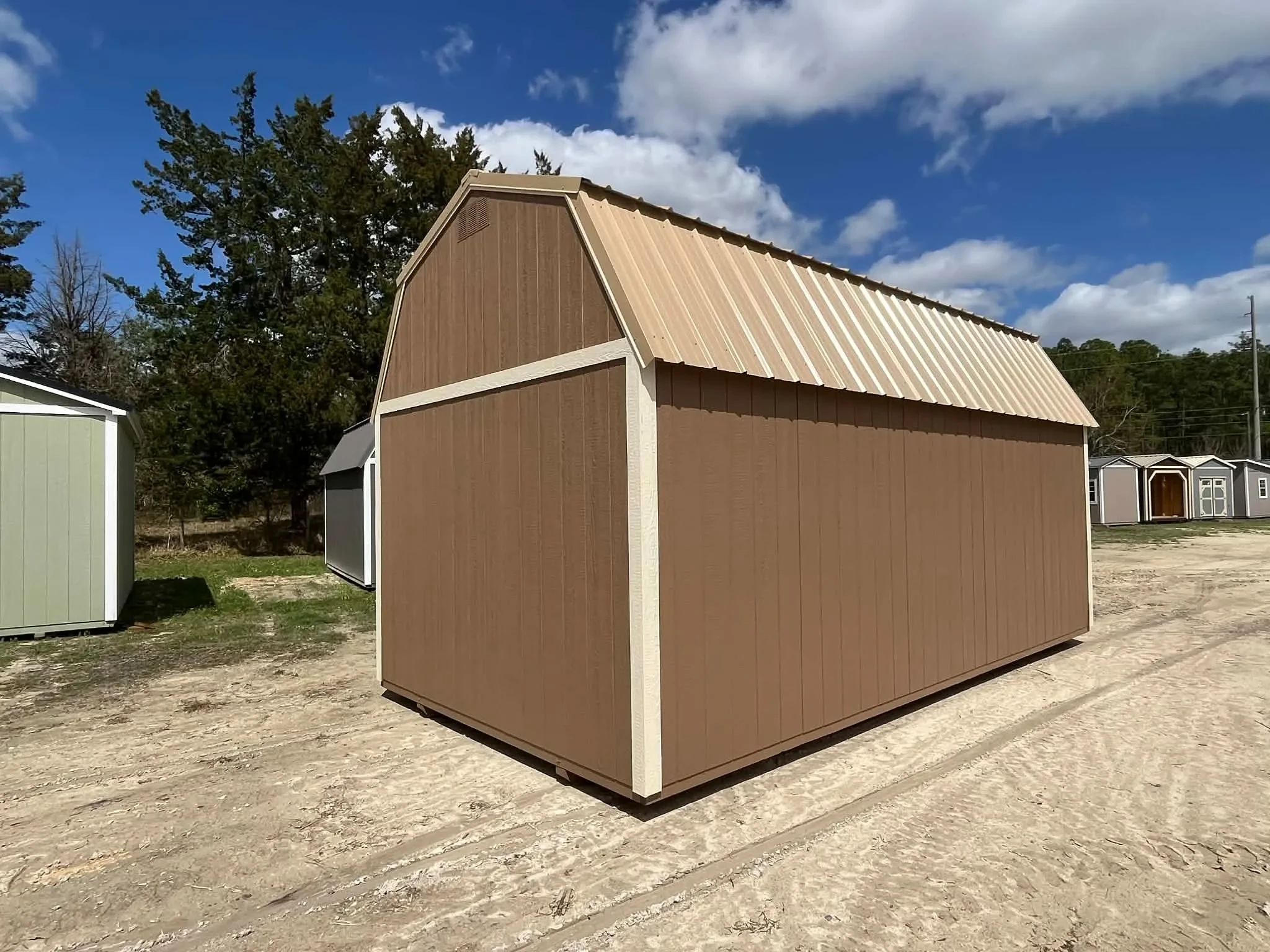 Exterior rear view of a nuthatch color 10x20 lofted barn