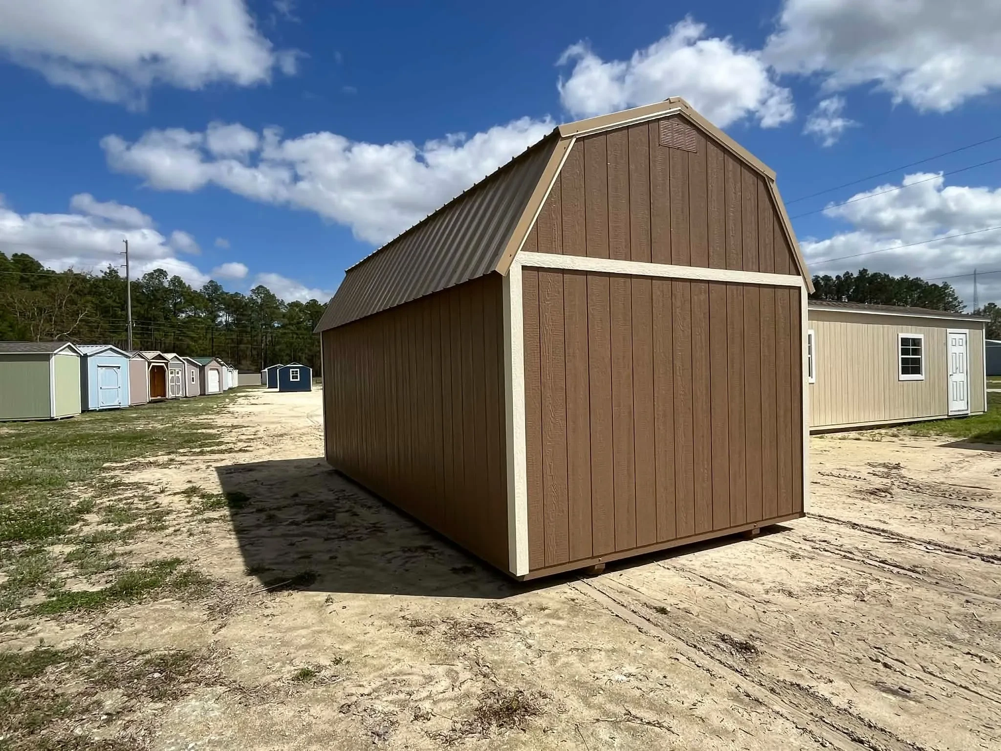 Exterior rear view of a nuthatch color 10x20 lofted barn