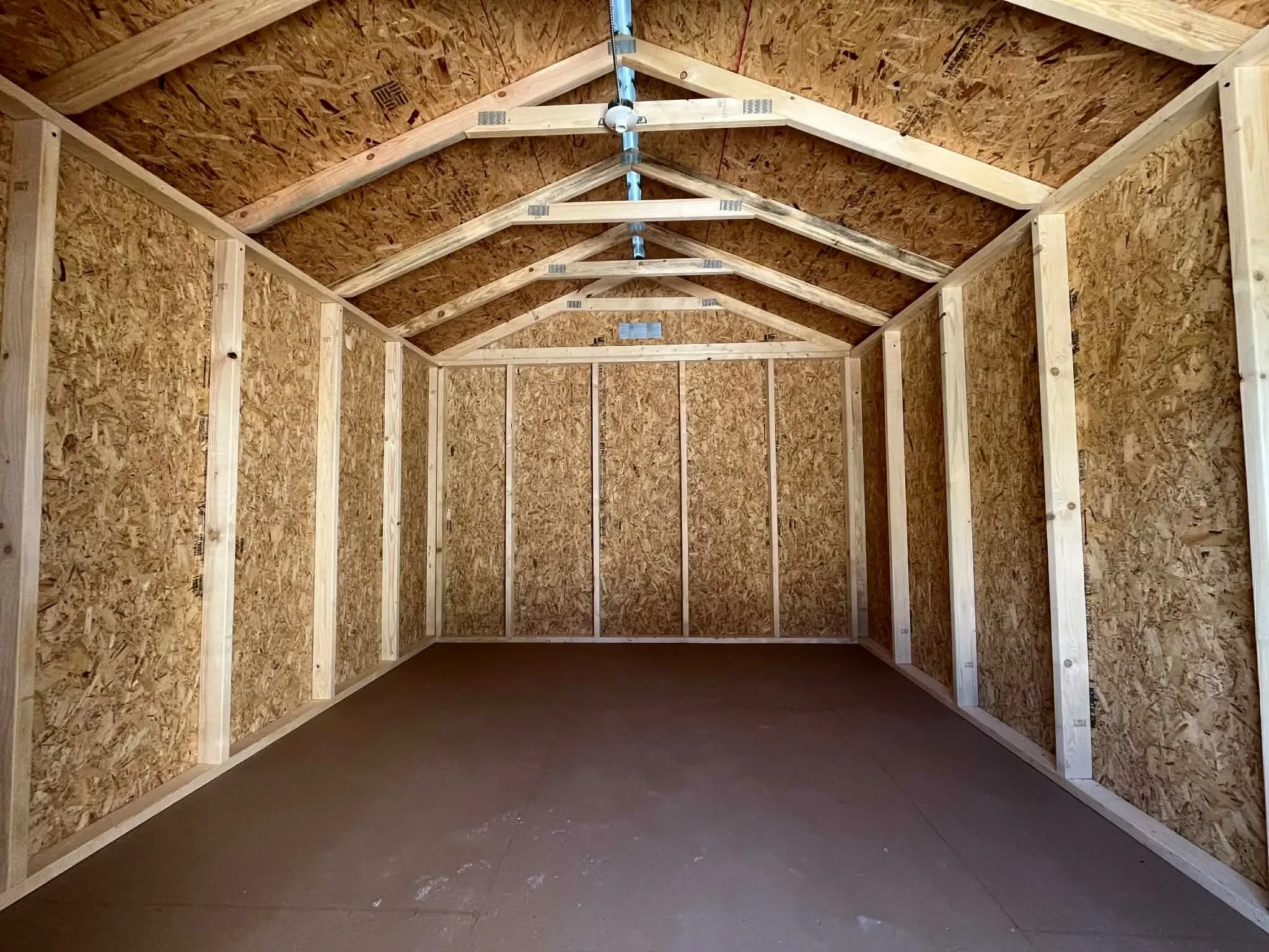 Interior view of a 10x12 garden shed economy showing through the door