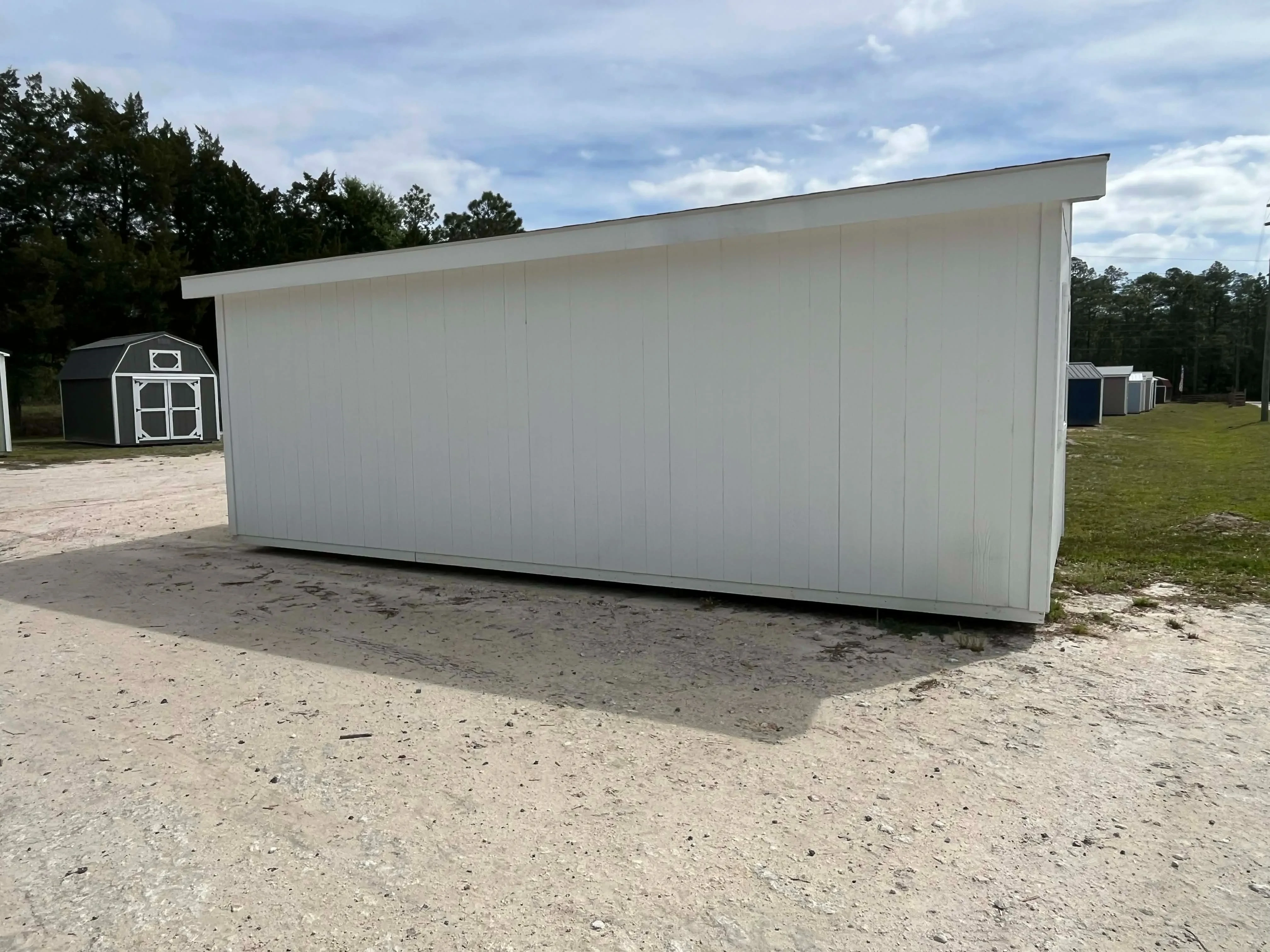 Exterior rear view of a white 10x24 urban