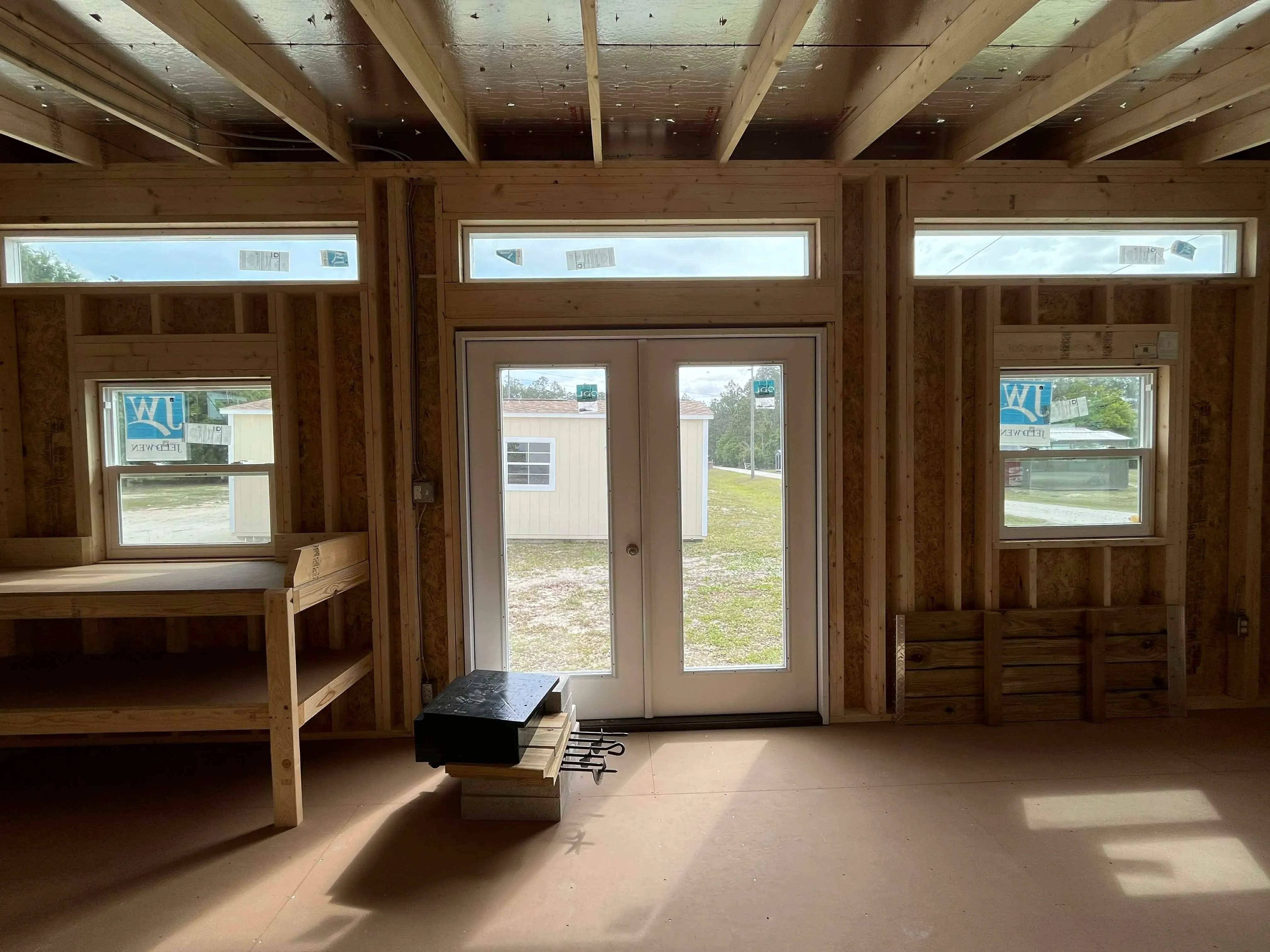 Interior view from back wall showing the windows and doors
