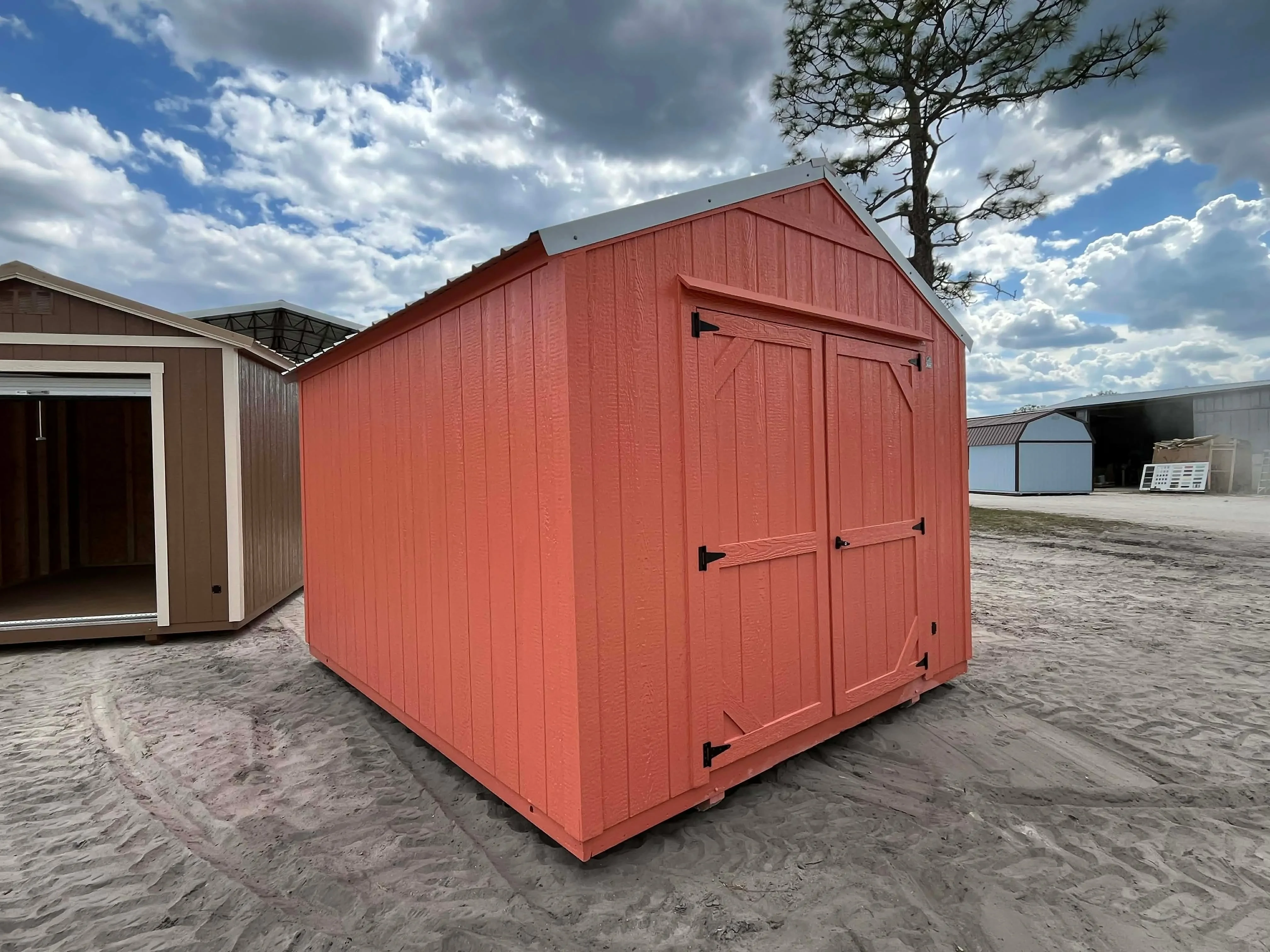 Exterior left front view of a 10x12 garden shed economy showing the double wood doors