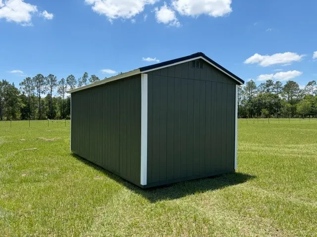 Exterior left rear view of a green 10x20 side garden shed showing the doors, windows and shutters