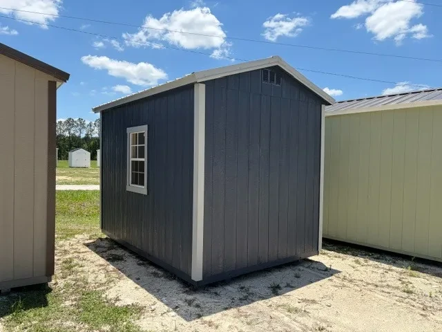 Exterior rear right view of an 8x12 garden shed showing a window