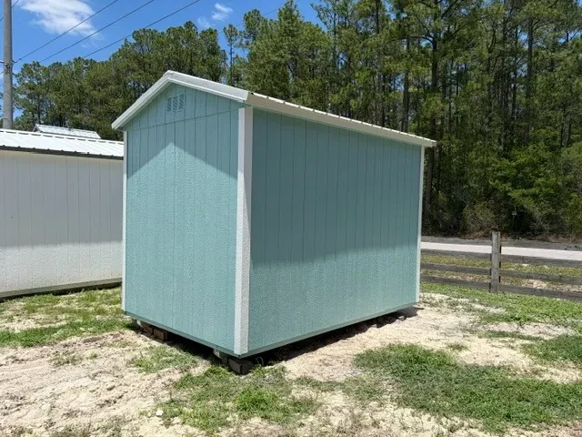 Exterior left rear view of a aqua 8x12 garden shed
