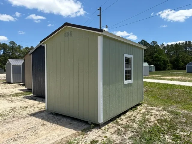 Exterior rear of a sage green 8x12 Garden shed