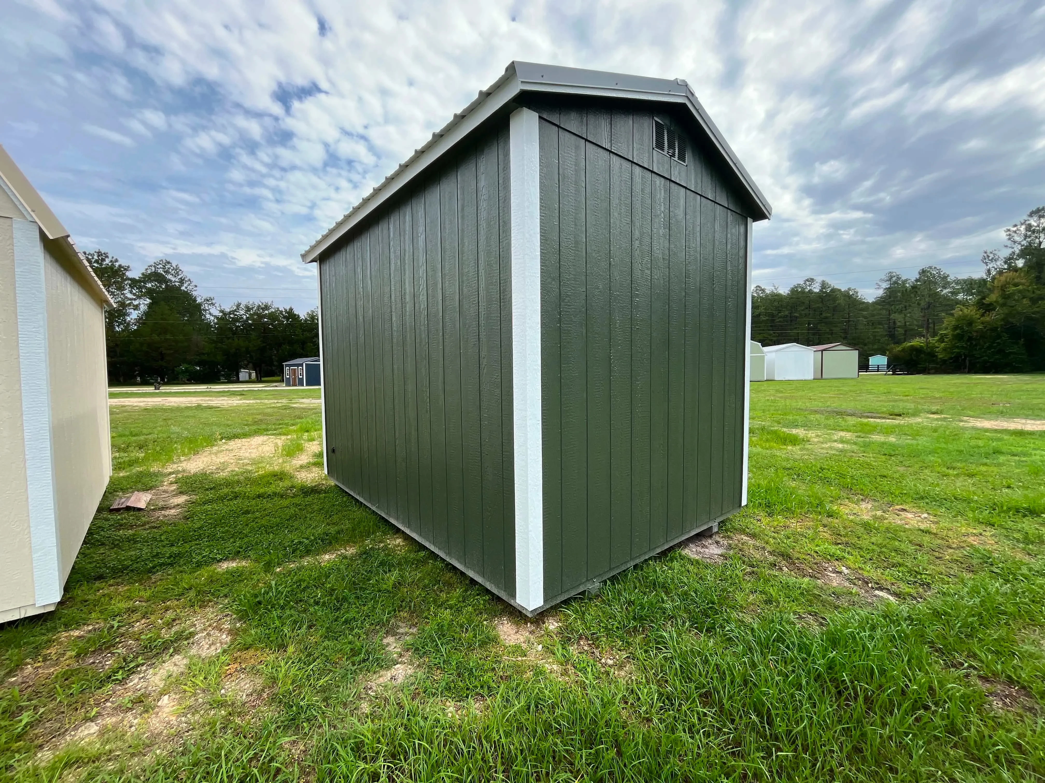 Exterior right rear view of a green 8x12 garden shed