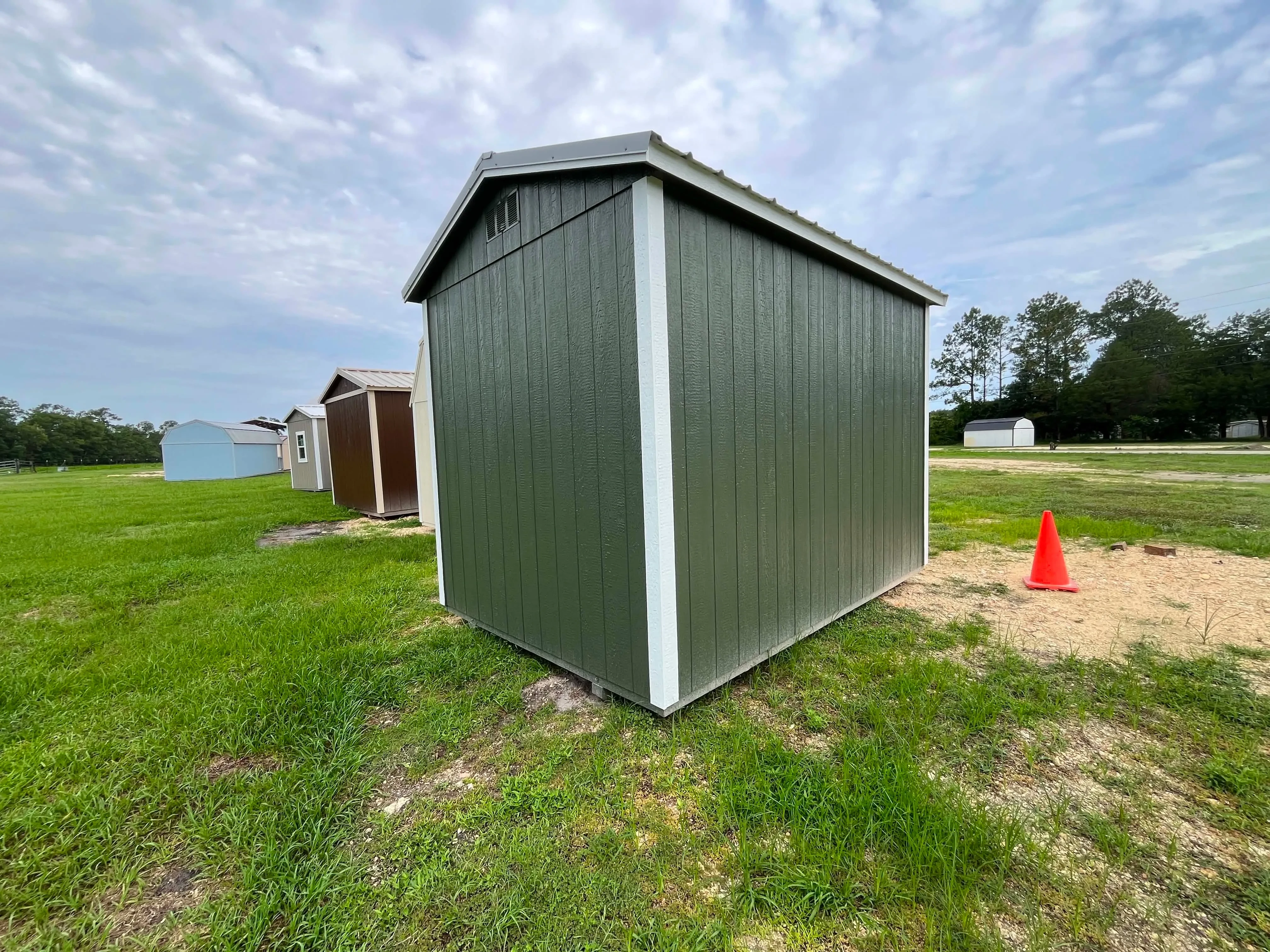 Exterior left rear view of a green 8x12 garden shed