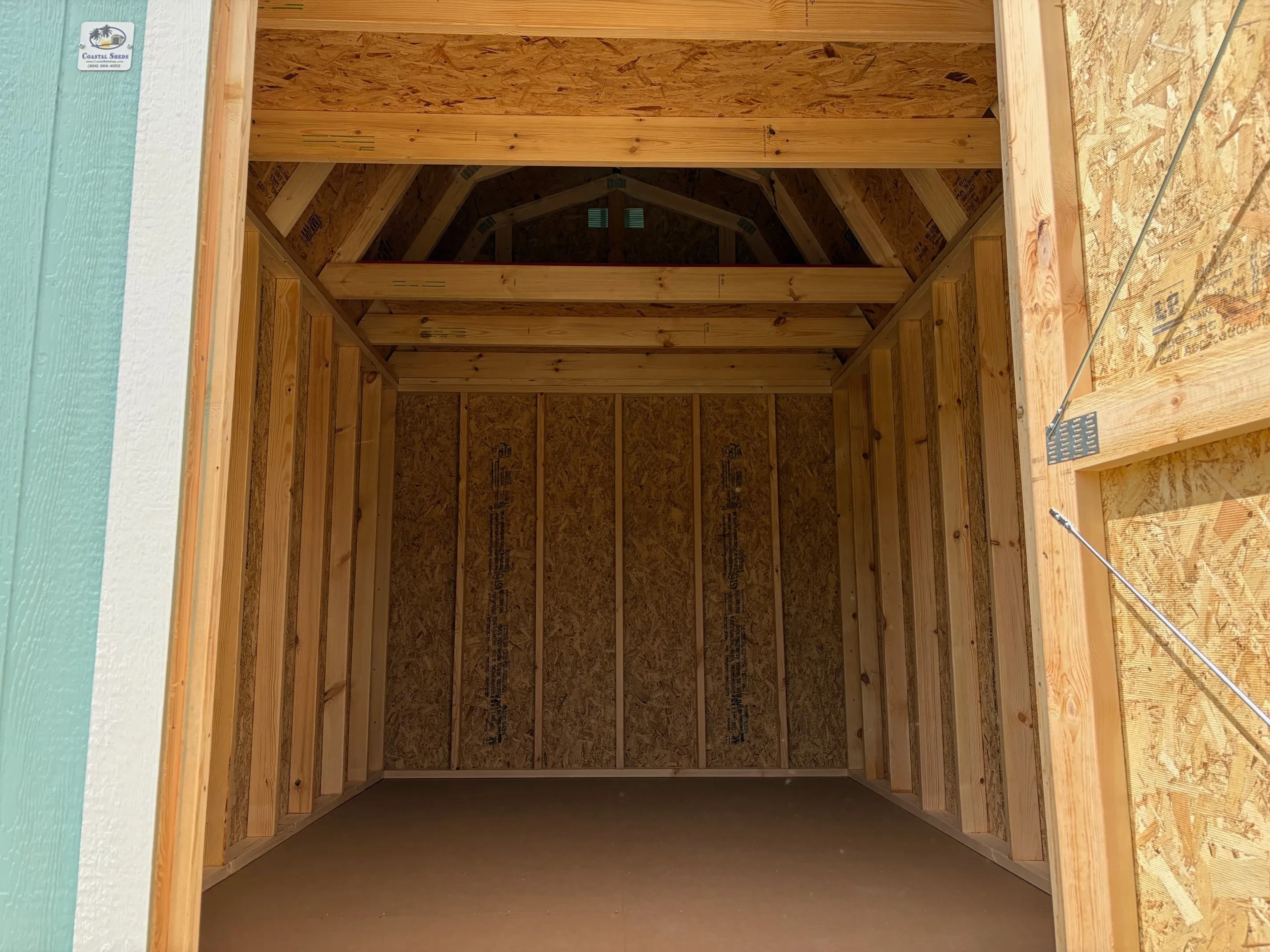 Interior of an 8x12 lofted barn showing the loft