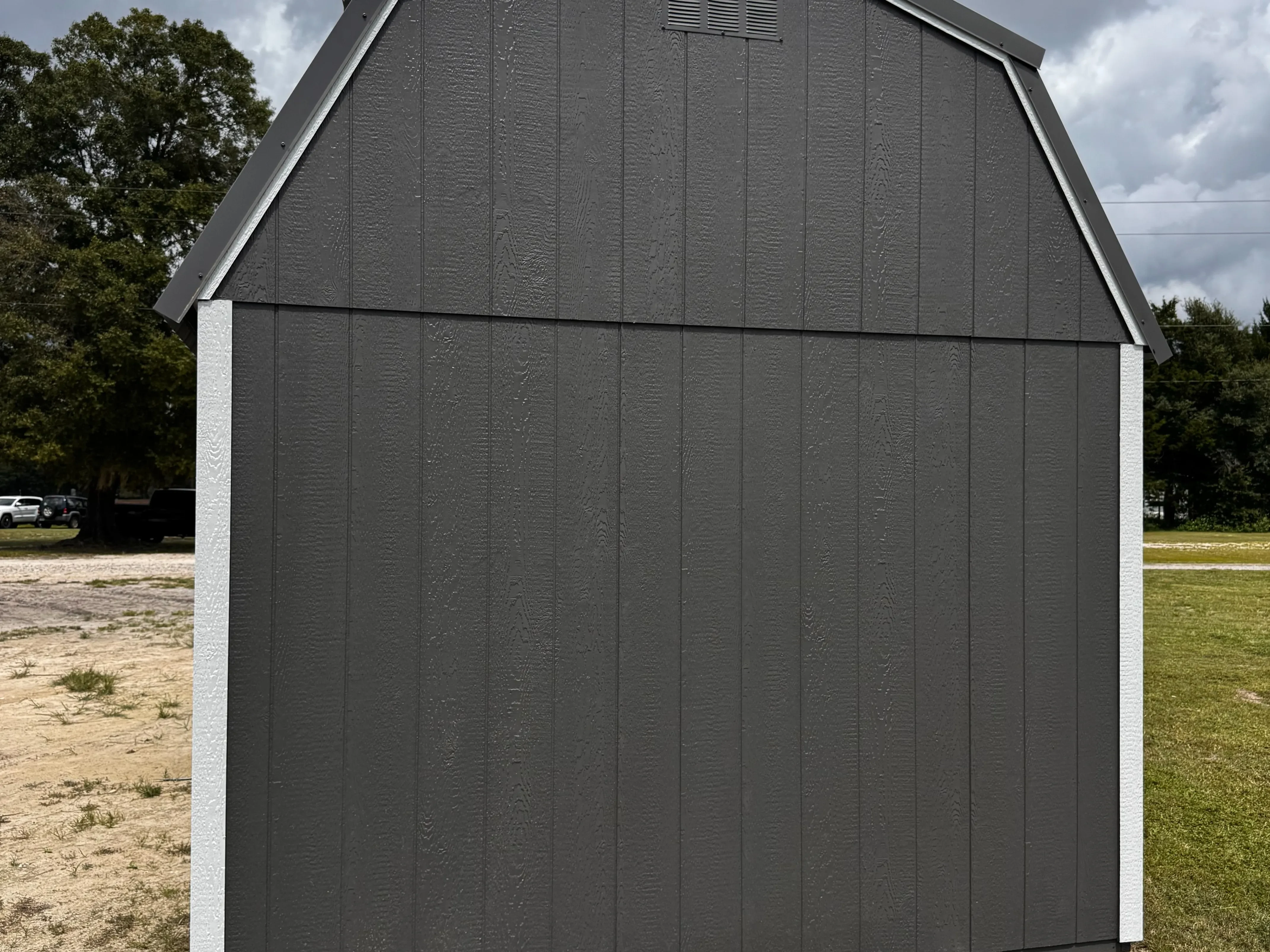 2Exterior back view of a charcoal 10x16 lofted barn